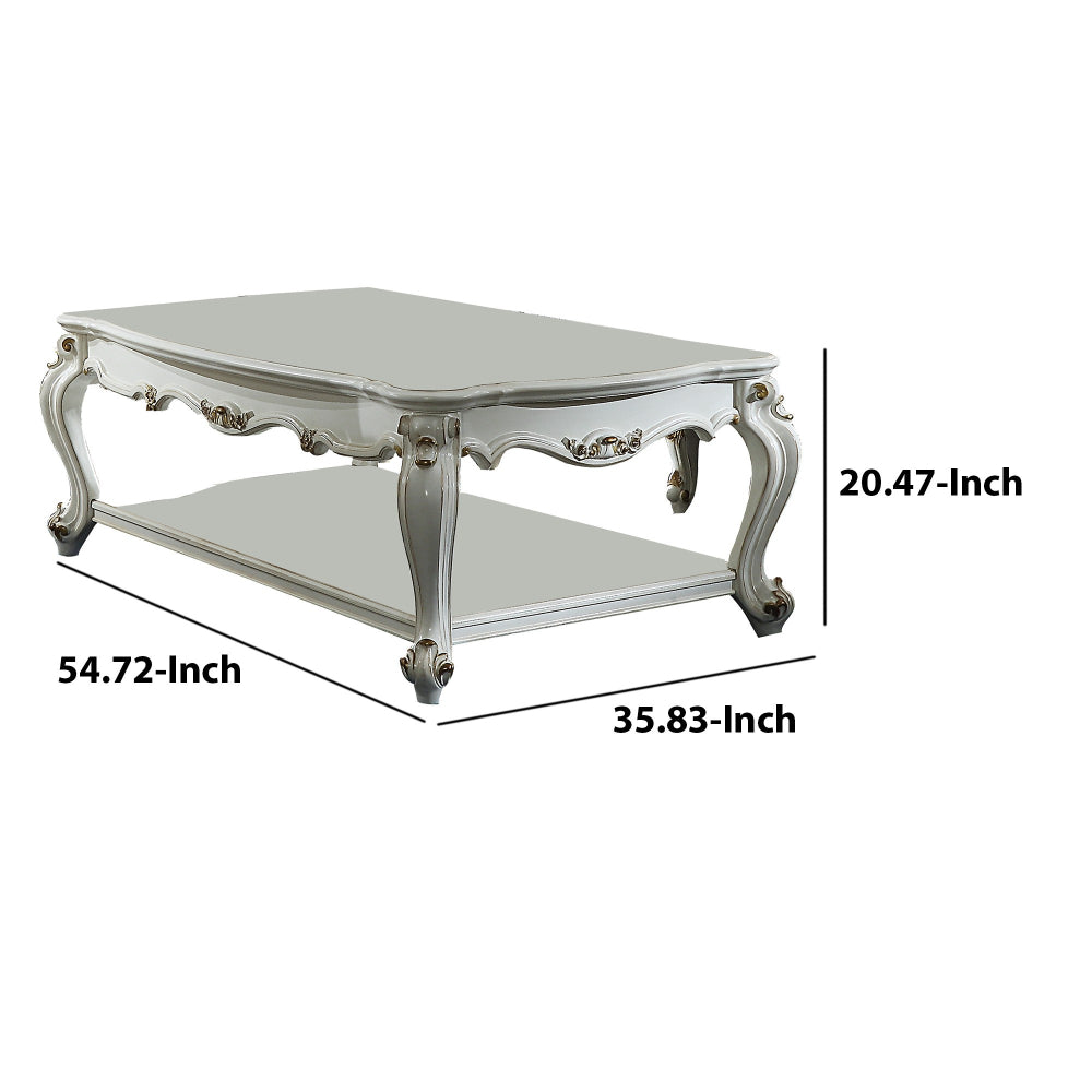 Benjara Traditional Style Wooden Coffee Table with Polyresin Carvings And Bottom Shelf, White