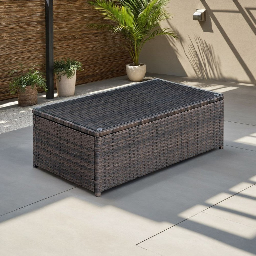 Benjara Rectangular Faux Rattan And Aluminum Coffee Table with Glass Top, Brown