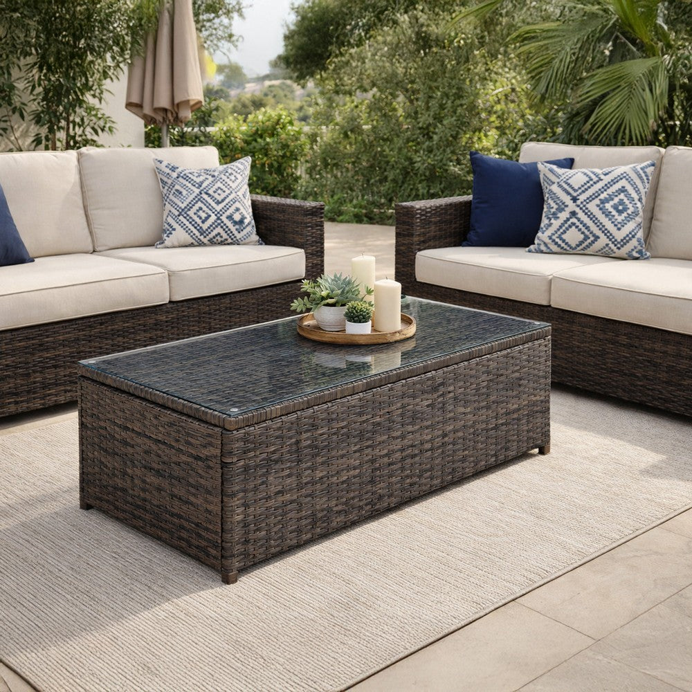 Benjara Rectangular Faux Rattan And Aluminum Coffee Table with Glass Top, Brown