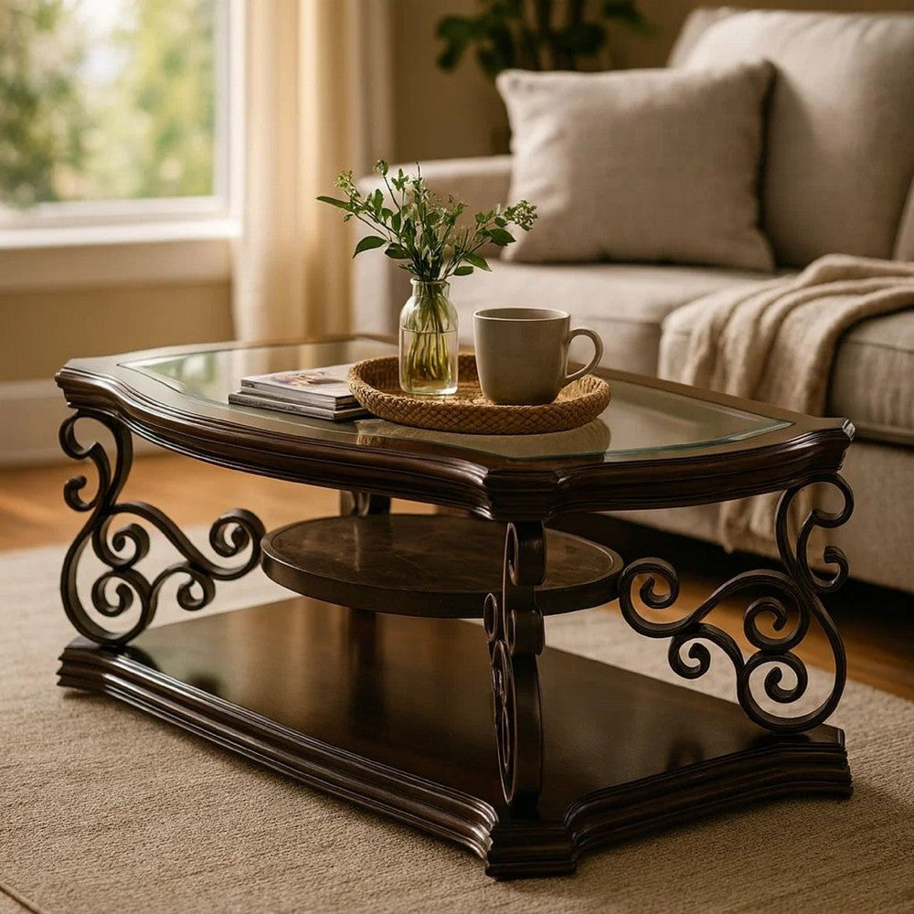 Benjara Tempered Glass Top Wooden Coffee Table with Ornate Metal Scrollwork, Brown