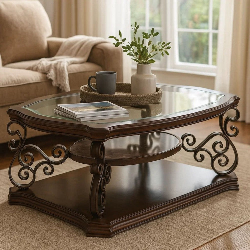 Benjara Tempered Glass Top Wooden Coffee Table with Ornate Metal Scrollwork, Brown