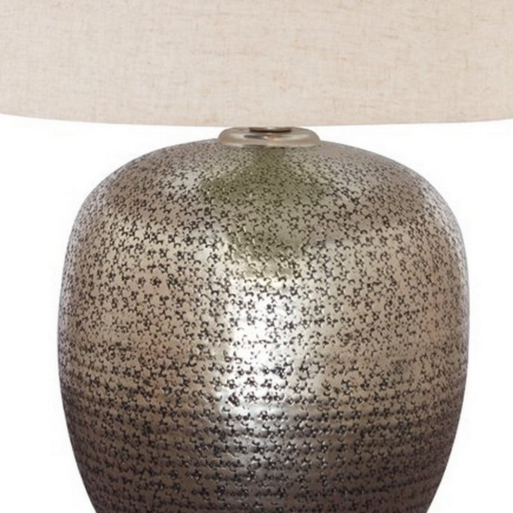 Benjara Bellied metal Body Table Lamp with Splotched Details, Brass And Cream