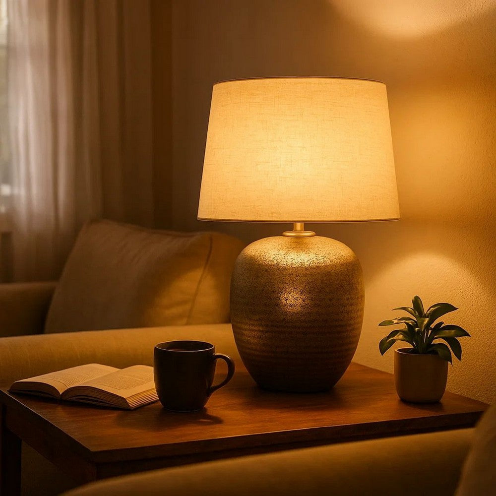 Benjara Bellied metal Body Table Lamp with Splotched Details, Brass And Cream