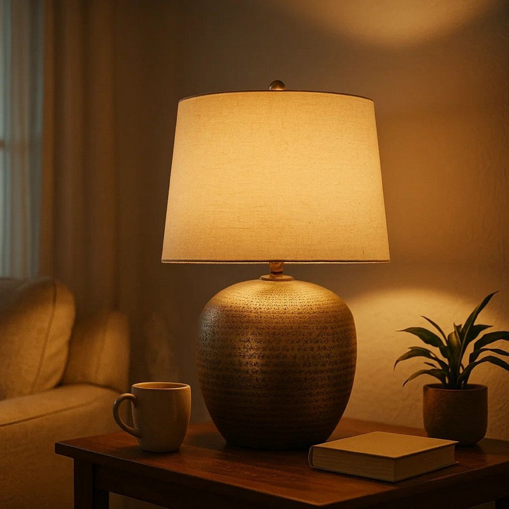 Benjara Bellied metal Body Table Lamp with Splotched Details, Brass And Cream
