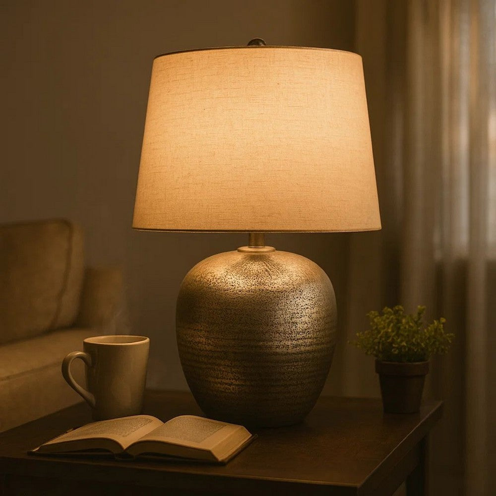 Benjara Bellied metal Body Table Lamp with Splotched Details, Brass And Cream
