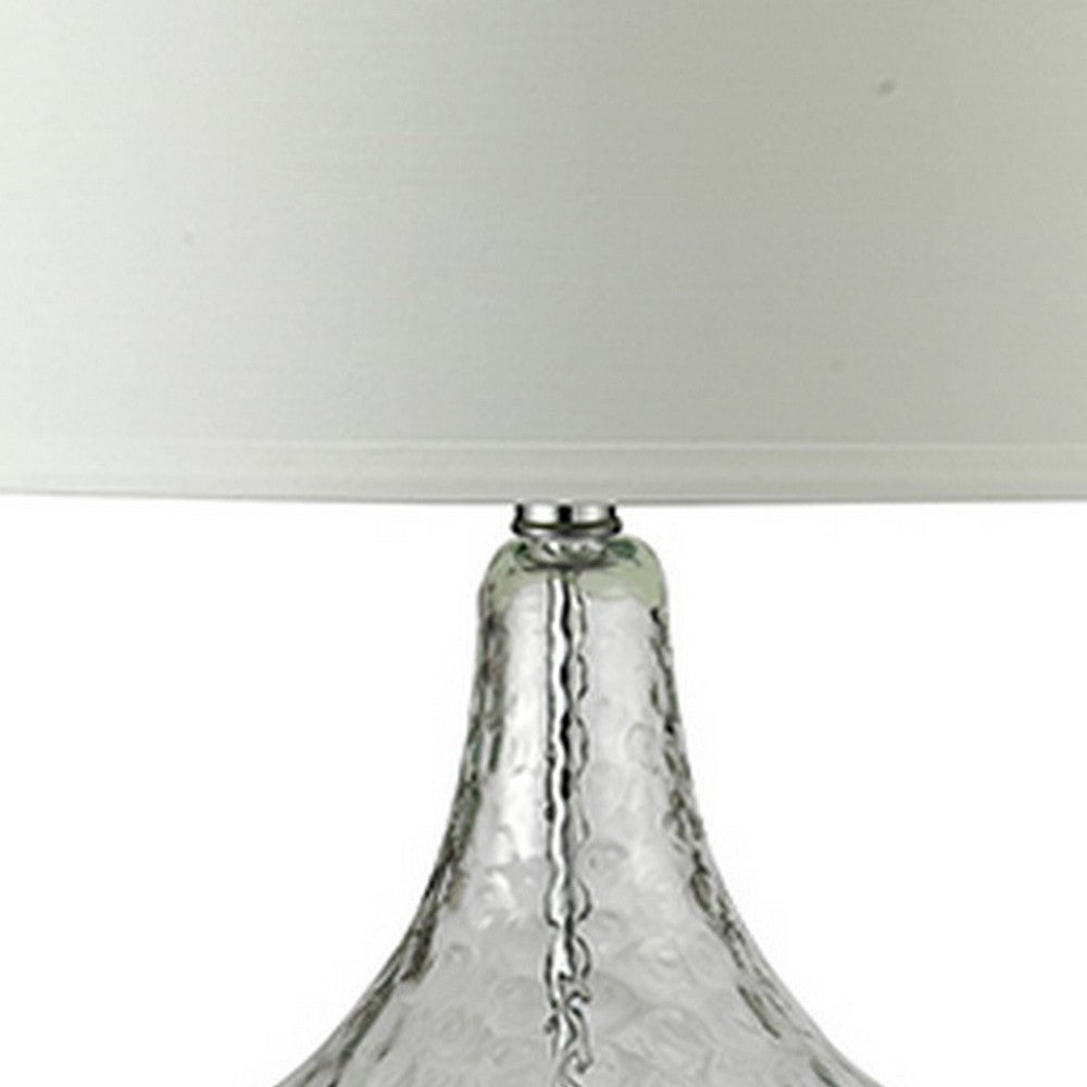 Benjara Table Lamp with Pot Bellied Glass Body, Clear And White