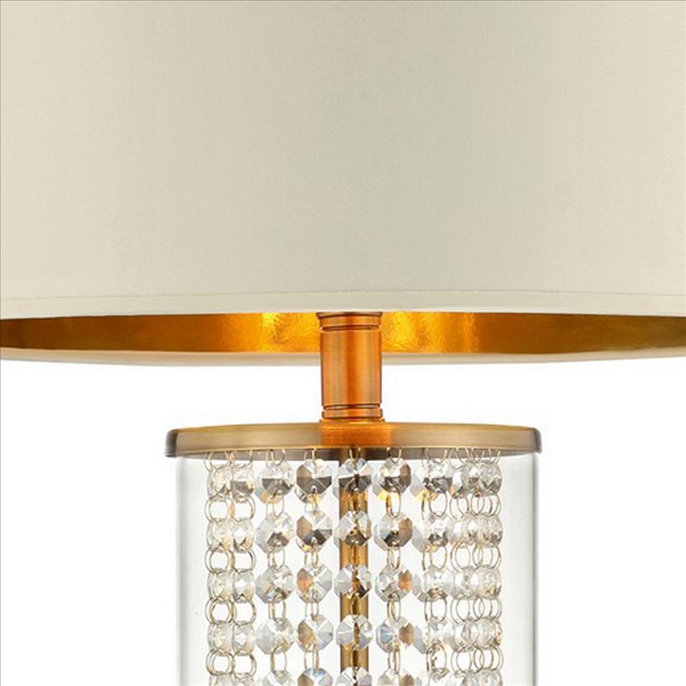 Benjara Table Lamp with Cylindrical Drum And Stacked Crystals, Gold