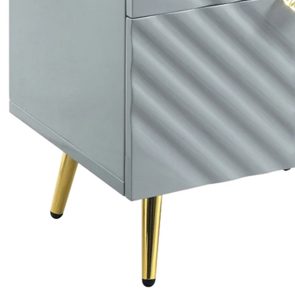 Benjara Tyra 25 Inch Wood Nightstand, Textured Wavy Design, Gold Metal Legs, Gray