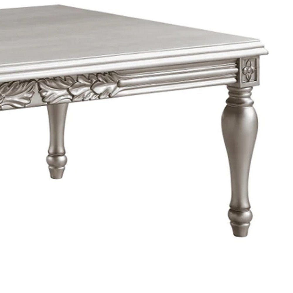 Benjara Sto 59 Inch Classic Coffee Table, Floral Trim, Turned Legs, Wood, Silver