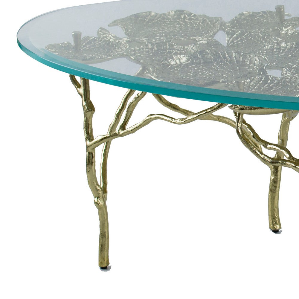 Benjara 47 Inch Artisanal Coffee Table with Metal Frame, Oval Clear Glass Top, Gold