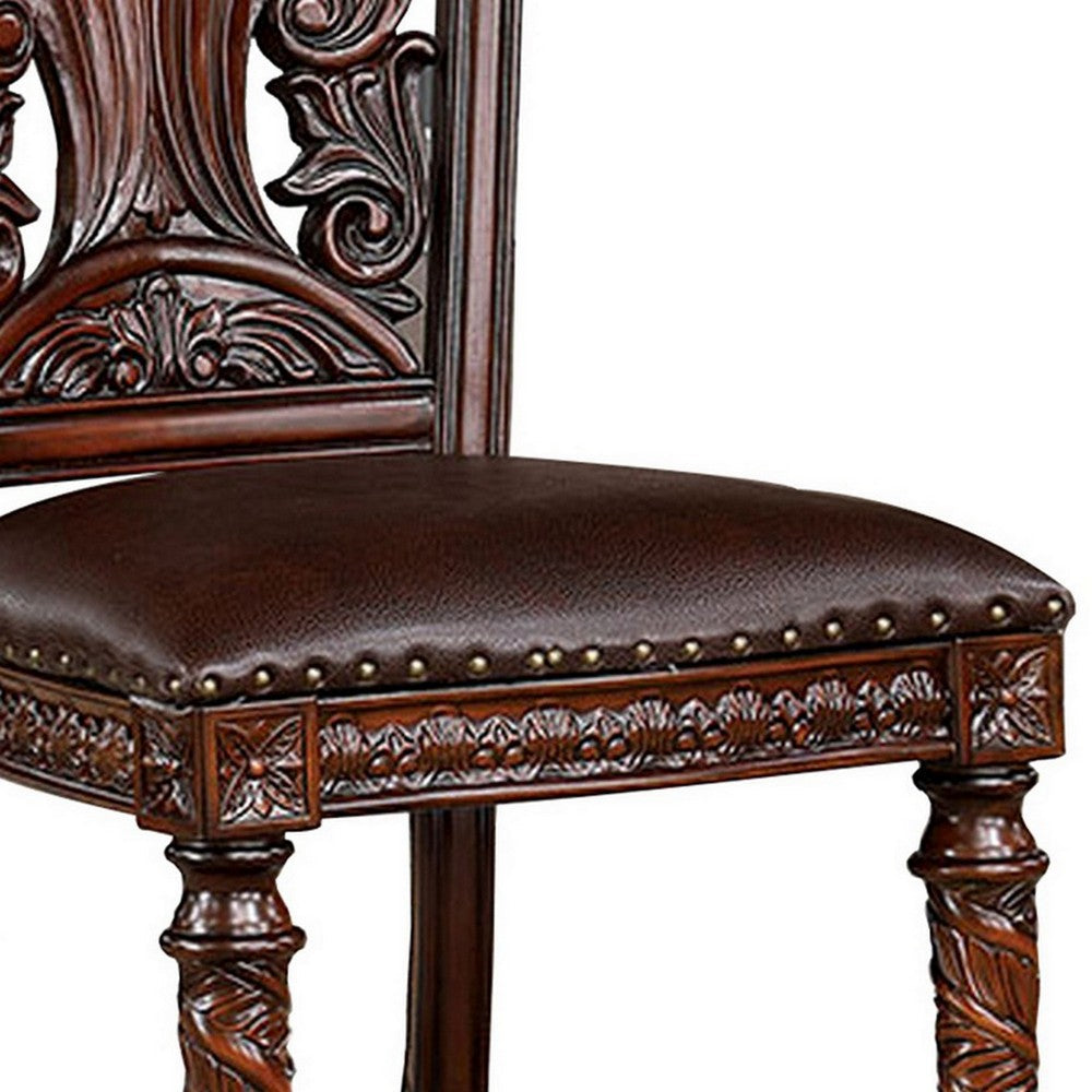 Benjara Iga 22 Inch Carved Dining Chair, Set of 2, Faux Leather Seat, Nailhead Trim