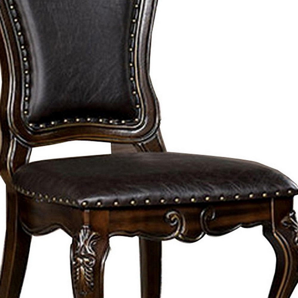Benjara Ons 23 Inch Carved Dining Chair, Set of 2, Nailhead Trim Brown Faux Leather