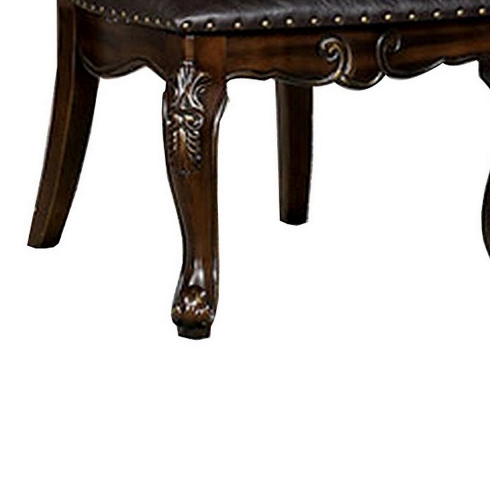 Benjara Ons 23 Inch Carved Dining Chair, Set of 2, Nailhead Trim Brown Faux Leather