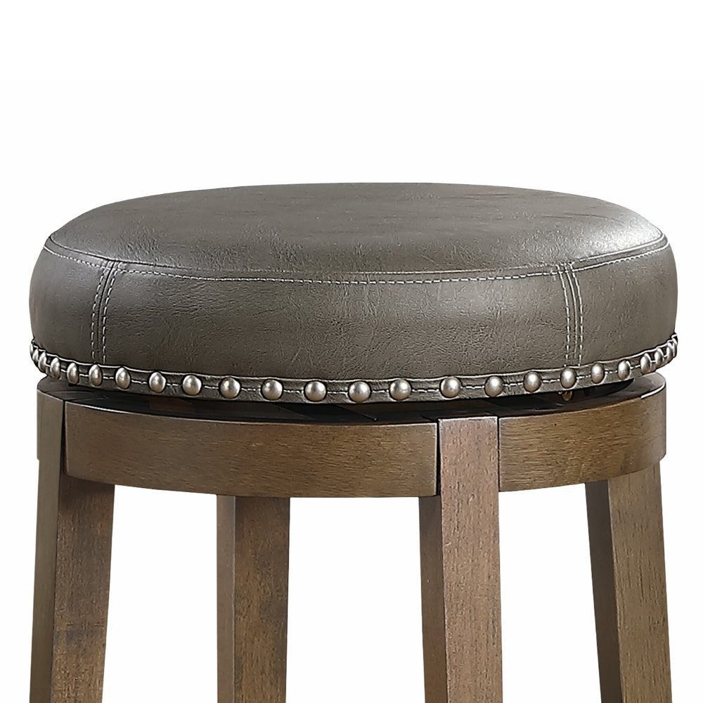 Benjara Bara 25 Inch Swivel Counter Stool Gray Round Faux Leather, Brown, Set of 2