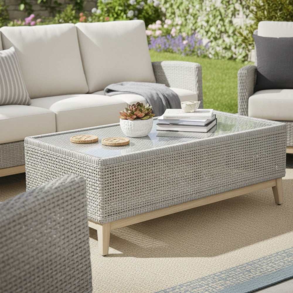 Benjara Yami 50 Inch Outdoor Coffee Table, Resin Wicker, Tempered Glass Top, Gray