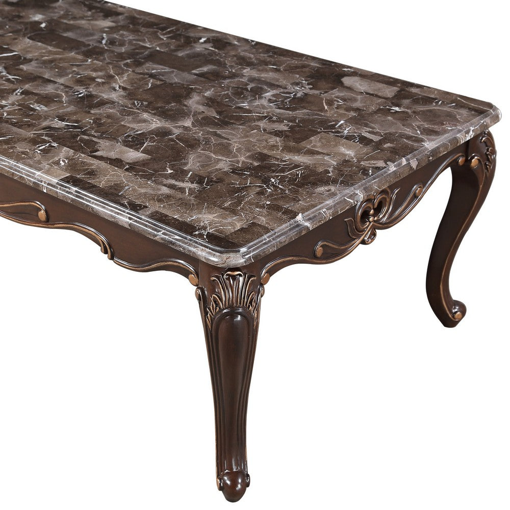 Benjara Cona 54 Inch Cocktail Coffee Table, Carved Gold Accent, Cherry Brown, Gray