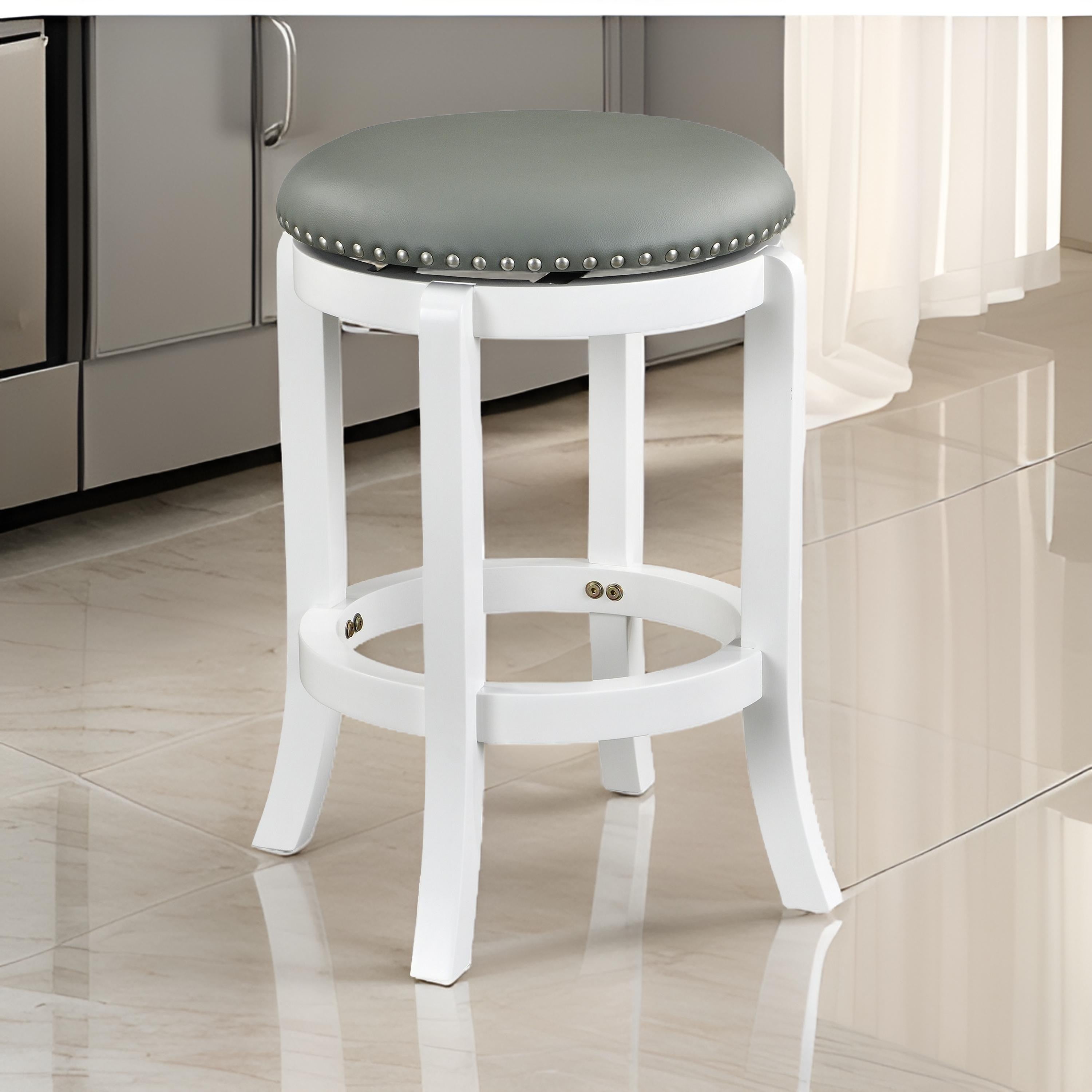 Benjara Ovi 25 Inch Backless Swivel Counter Stool, Gray Faux Leather, Nailhead Trim