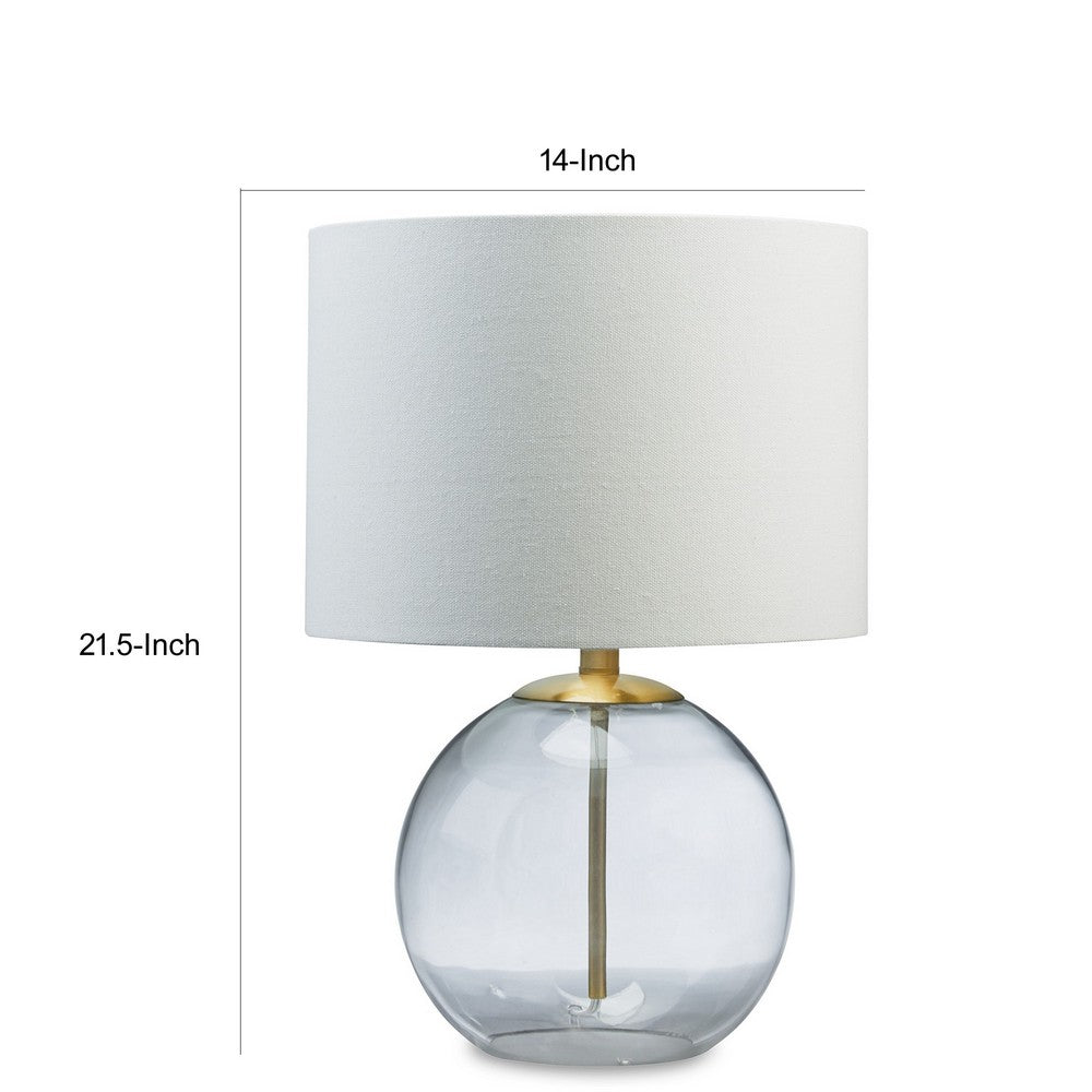 Benjara 21 Inch Table Lamp, White Drum Shade, Round Clear Glass Base, Brass Metal