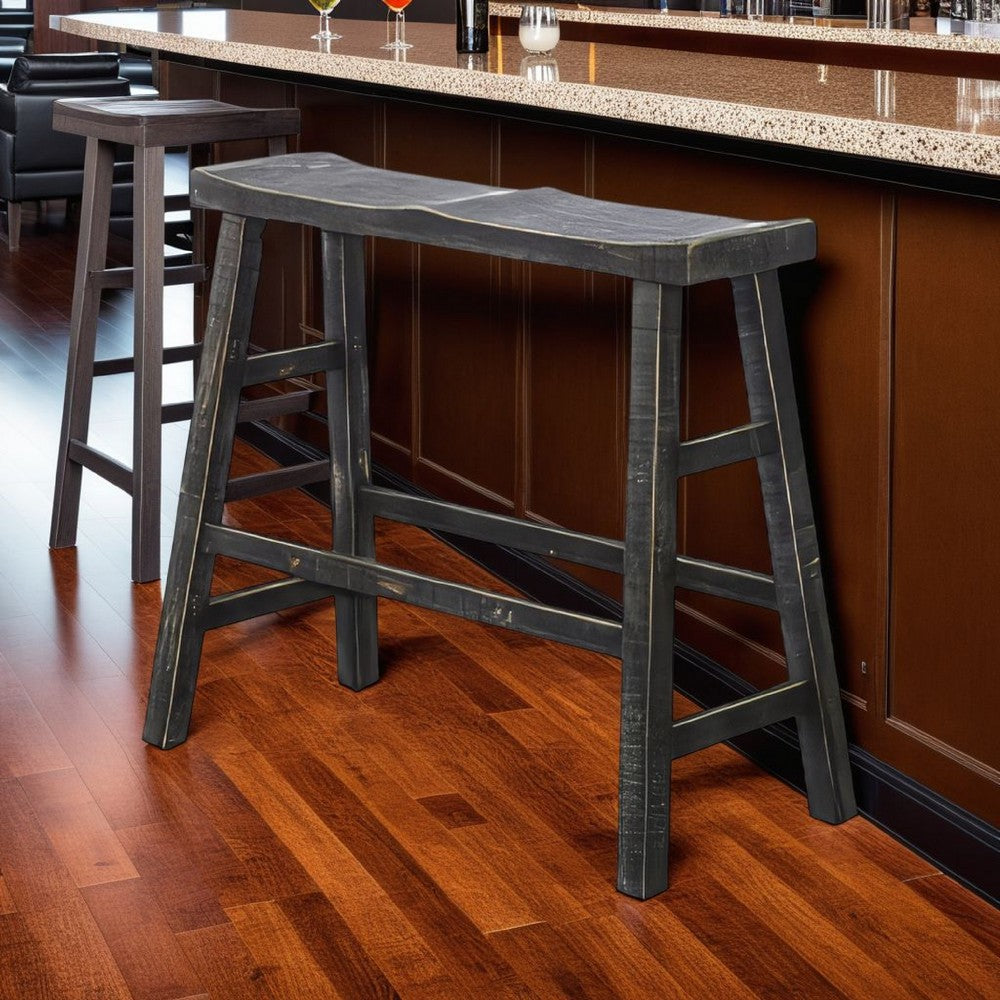 Benjara Rena Bar Height Bench | Trestle Legs with Footrests | 33" Wide Rustic Black Mahogany Wood