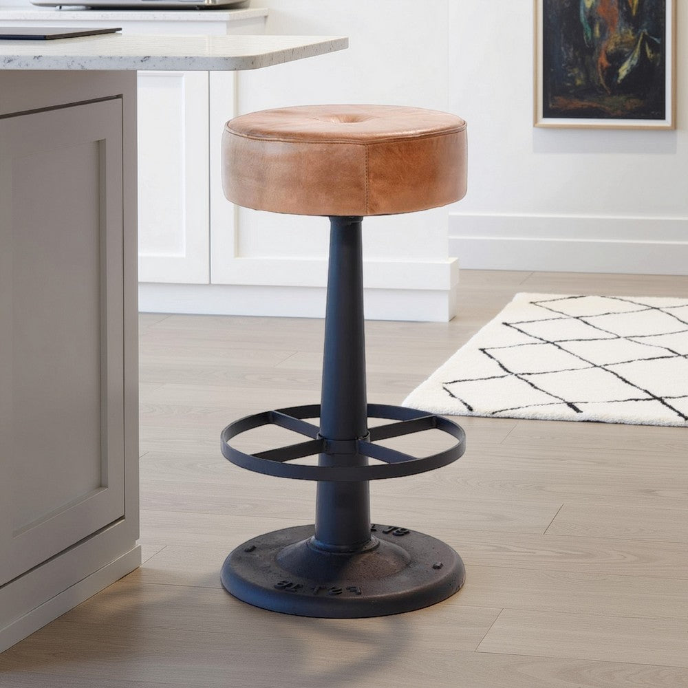 Benjara Counter Stool, Brown Goat Leather, Round Footrest, Black Iron Pedestal