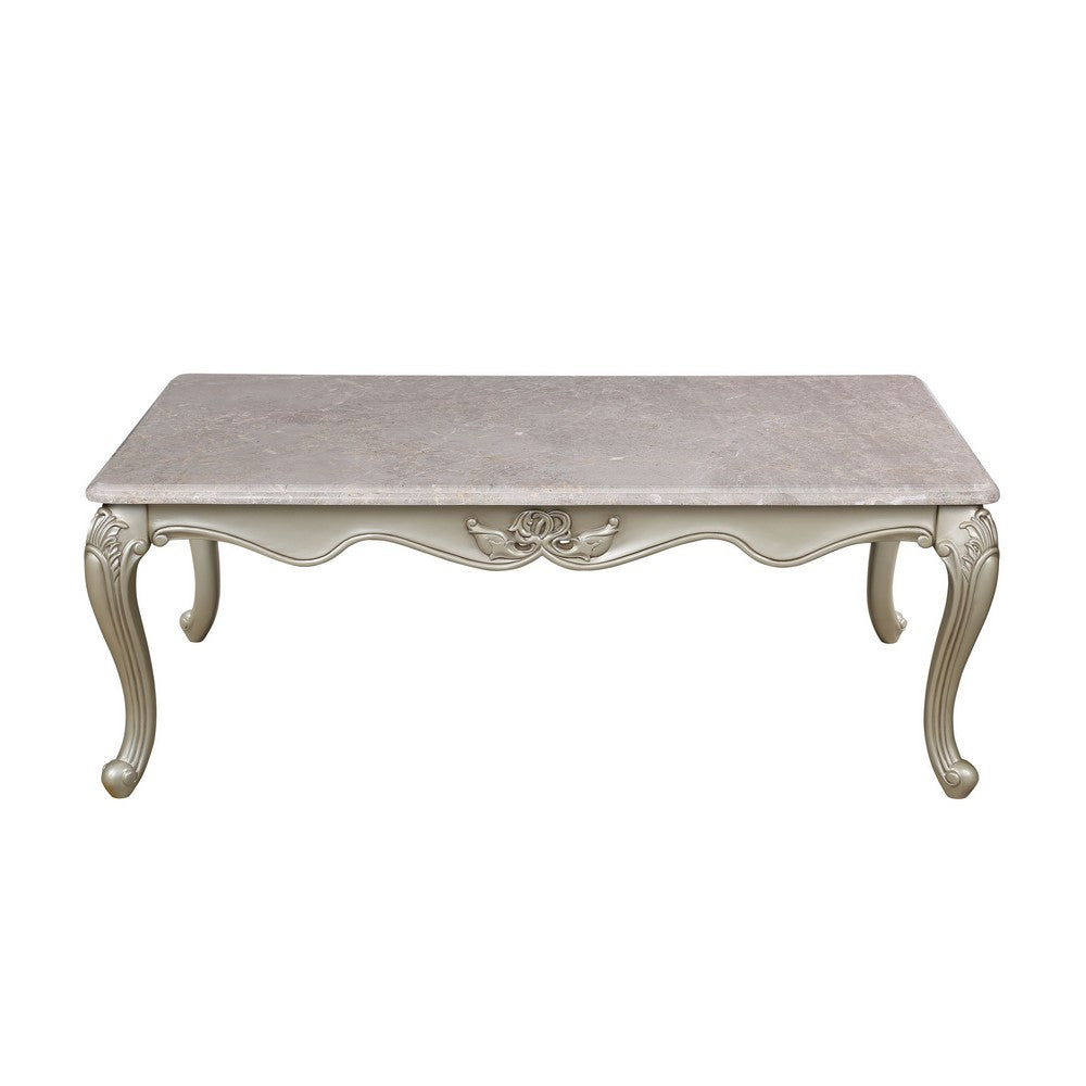 Benjara Kerra Cocktail Coffee Table, Beige Marble, Carved Champagne 54 Inch