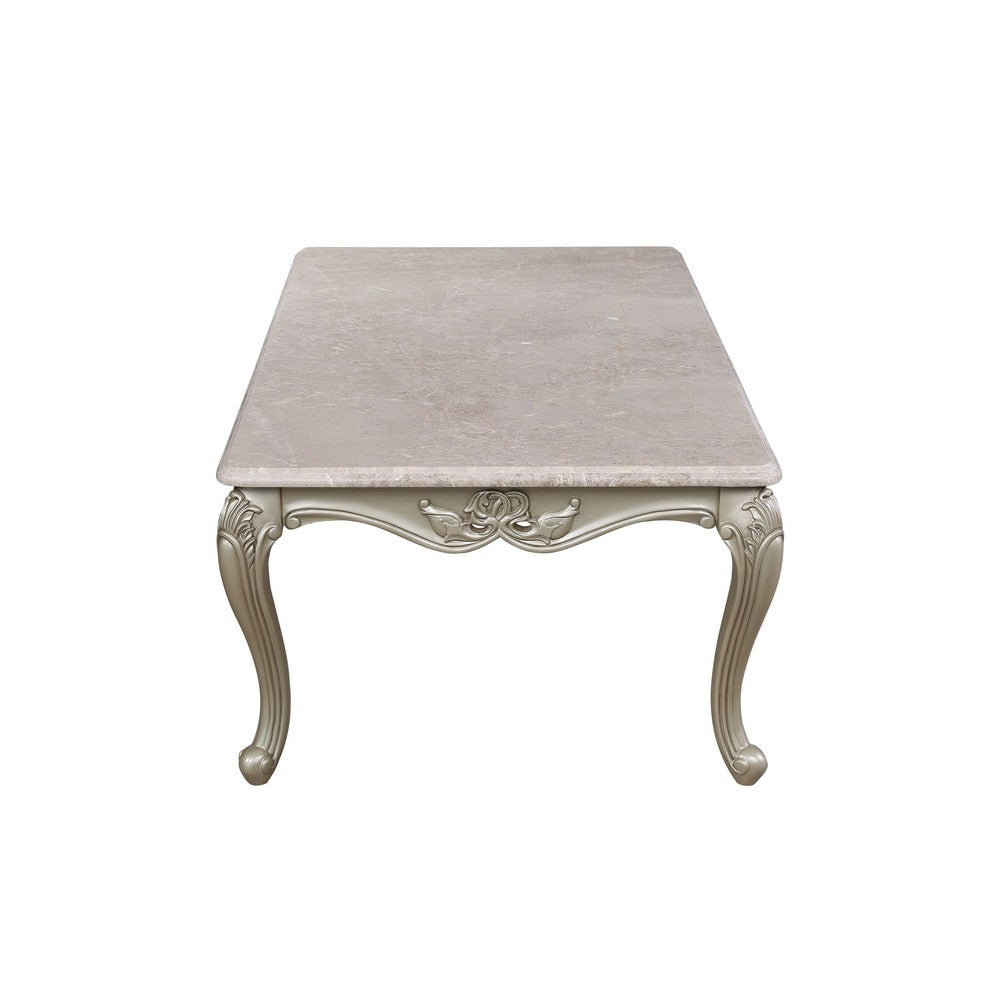 Benjara Kerra Cocktail Coffee Table, Beige Marble, Carved Champagne 54 Inch