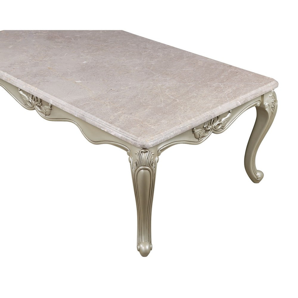 Benjara Kerra Cocktail Coffee Table, Beige Marble, Carved Champagne 54 Inch