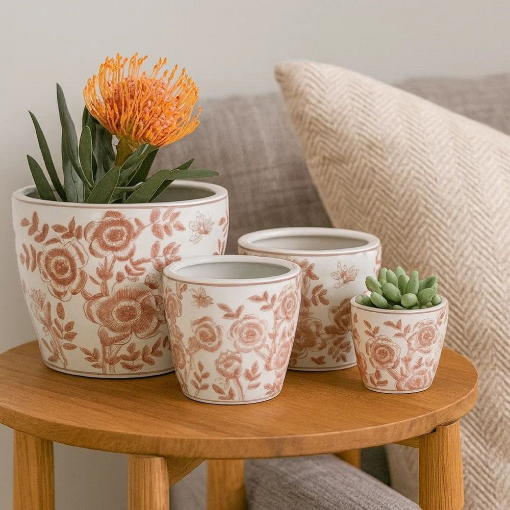 Benjara Kerry Accent Planter Pot Set of 4, Pink Floral Pattern, White Ceramic