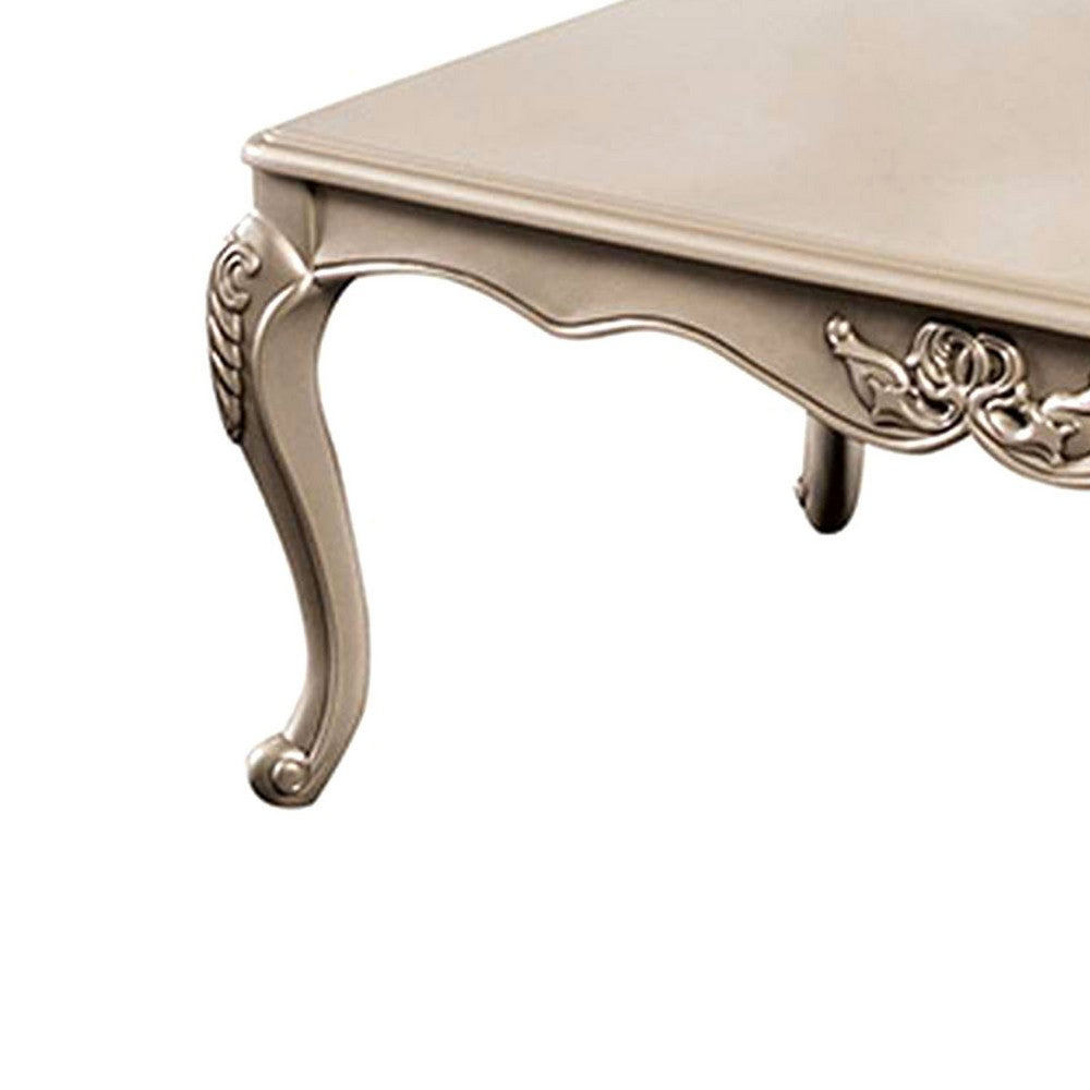 Benjara Ery Coffee Table, Champagne Wood Frame, Carved Details, 48 Inch