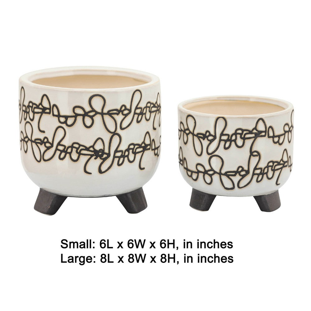 Benjara Garden Footed Planter Set of 2, Black Scribble Pattern, Beige Ceramic