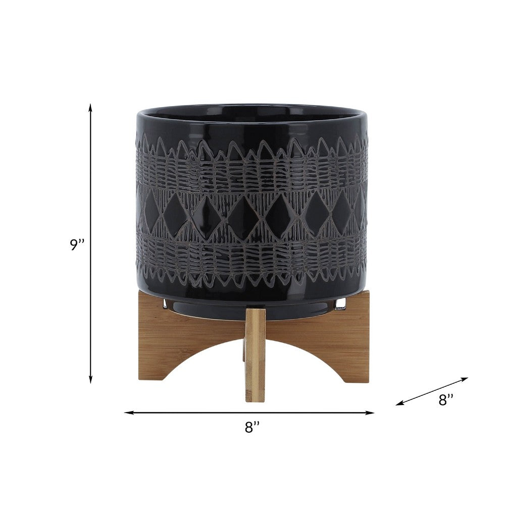 Benjara Jeny Flower Planter Pot on Wood Stand, Black Aztec Ceramic 8 Inch