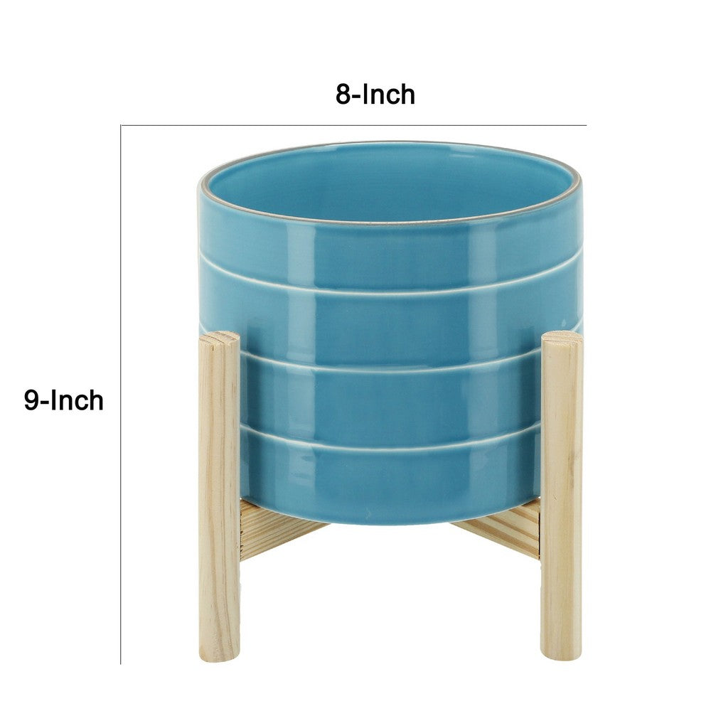 Benjara Indoor Outdoor Flower Planter, Wood Stand, Sky Blue Striped Ceramic 8 Inch