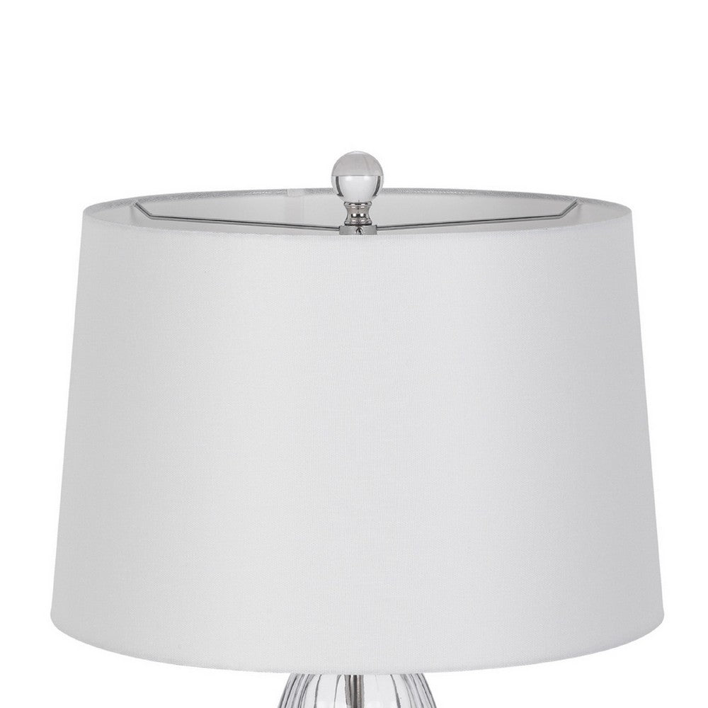 Benjara Table Lamp Set of 2, Bullet Shaped Clear Glass, Off White Drum Shade