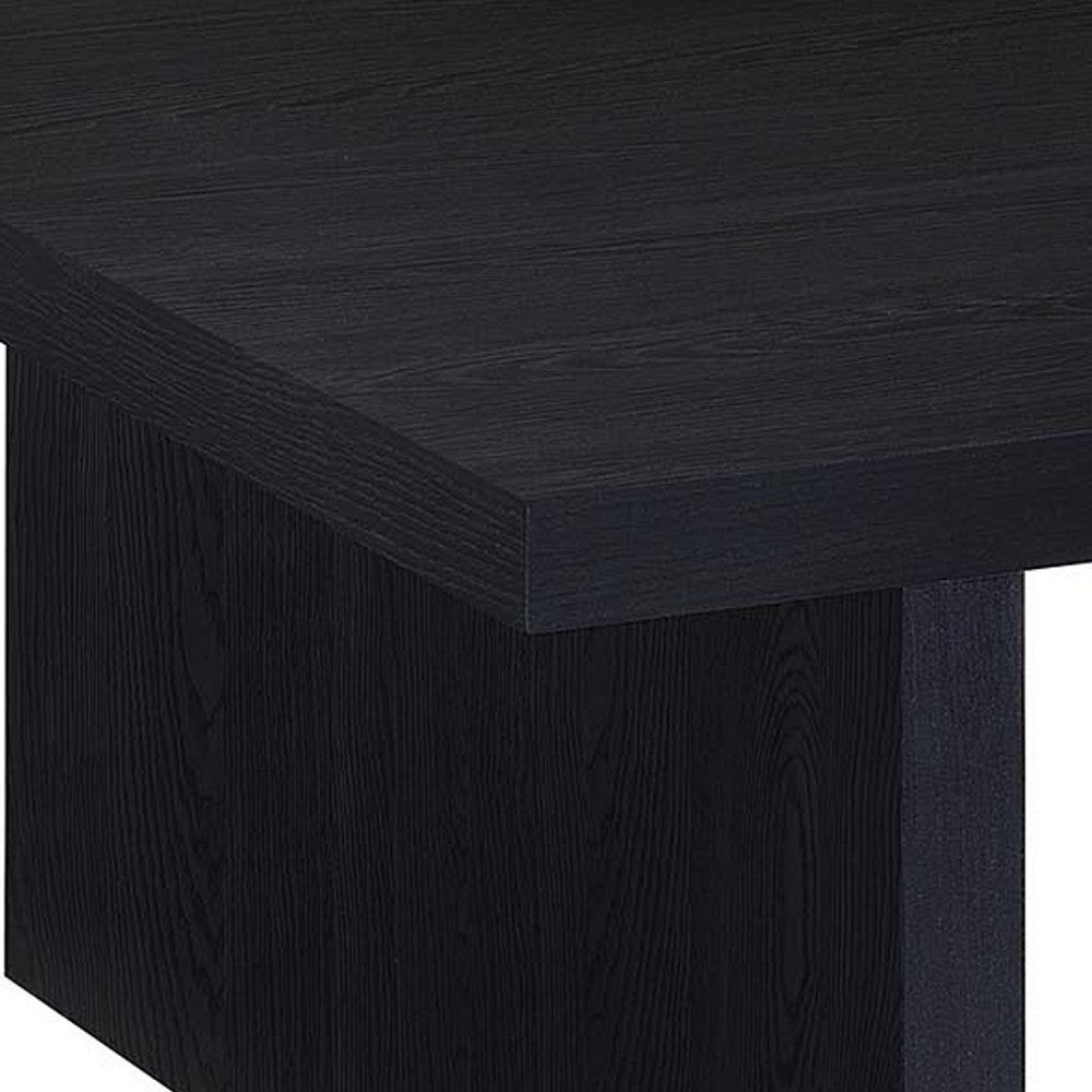 Benjara Maxy Rectangular Coffee Table with Slab-Style Base, Black Wood 54 Inch