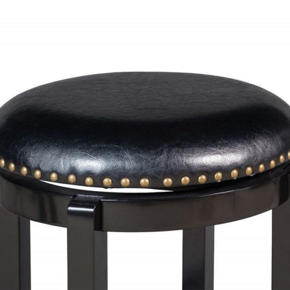 Benjara Nailhead Trim Round Leatherette Swivel Counter Stool with Flared Leg, Black