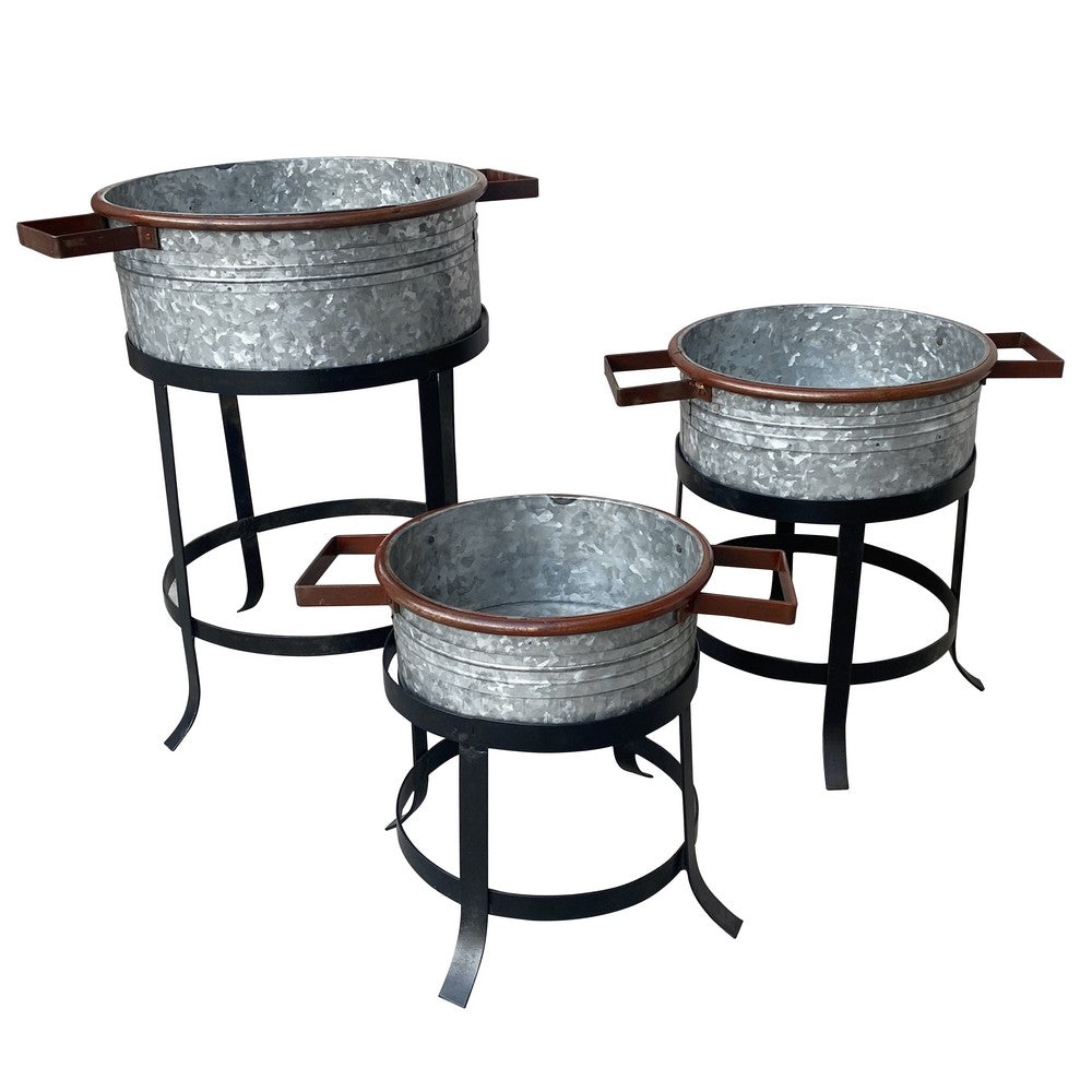 The Urban Port 21, 18, And 16 Inch 3 Piece Round Tub Metal Planter Set with Stand in Galvanized Gray And Black Iron