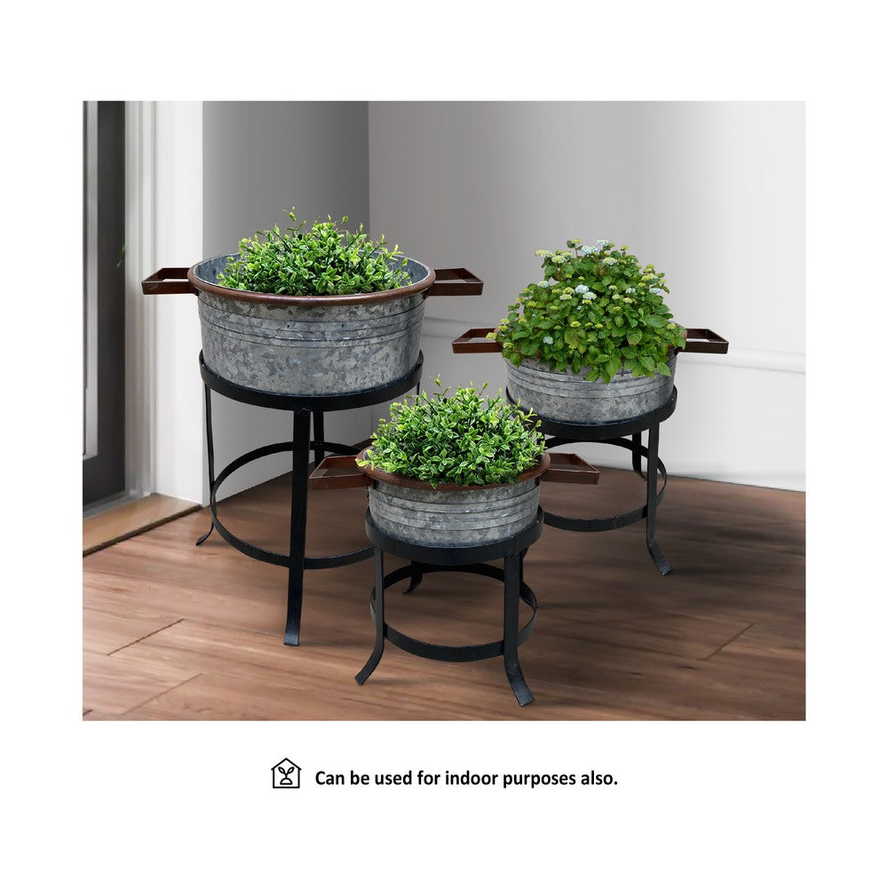 The Urban Port 21, 18, And 16 Inch 3 Piece Round Tub Metal Planter Set with Stand in Galvanized Gray And Black Iron