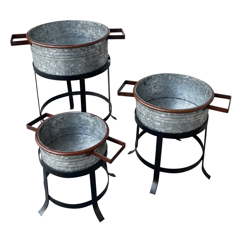 The Urban Port 21, 18, And 16 Inch 3 Piece Round Tub Metal Planter Set with Stand in Galvanized Gray And Black Iron