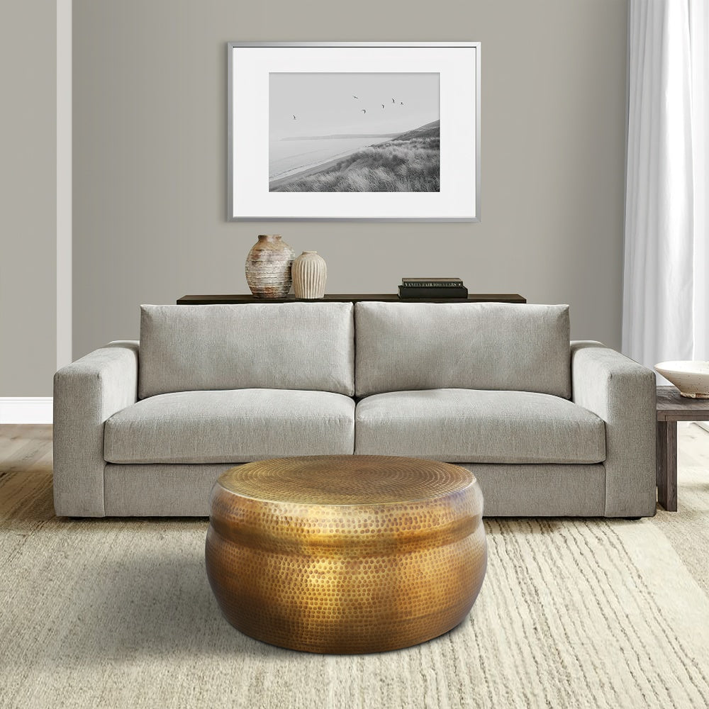 The Urban Port Kvira 32" Artisanal Round Drum Coffee Table, Hammered Embossed Texturing, Aluminum, Antique Brass