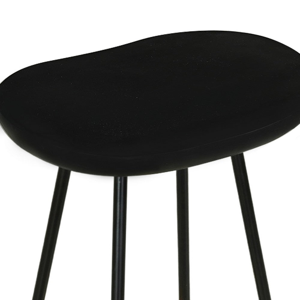 The Urban Port Elira 24" Backless Counter Stool with Mango Wood Saddle Seat | Black Iron Legs | Gold Footrest