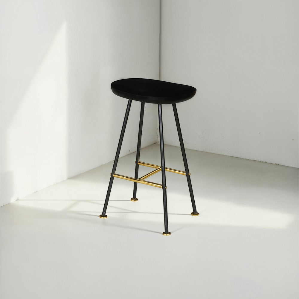 The Urban Port Elira 24" Backless Counter Stool with Mango Wood Saddle Seat | Black Iron Legs | Gold Footrest