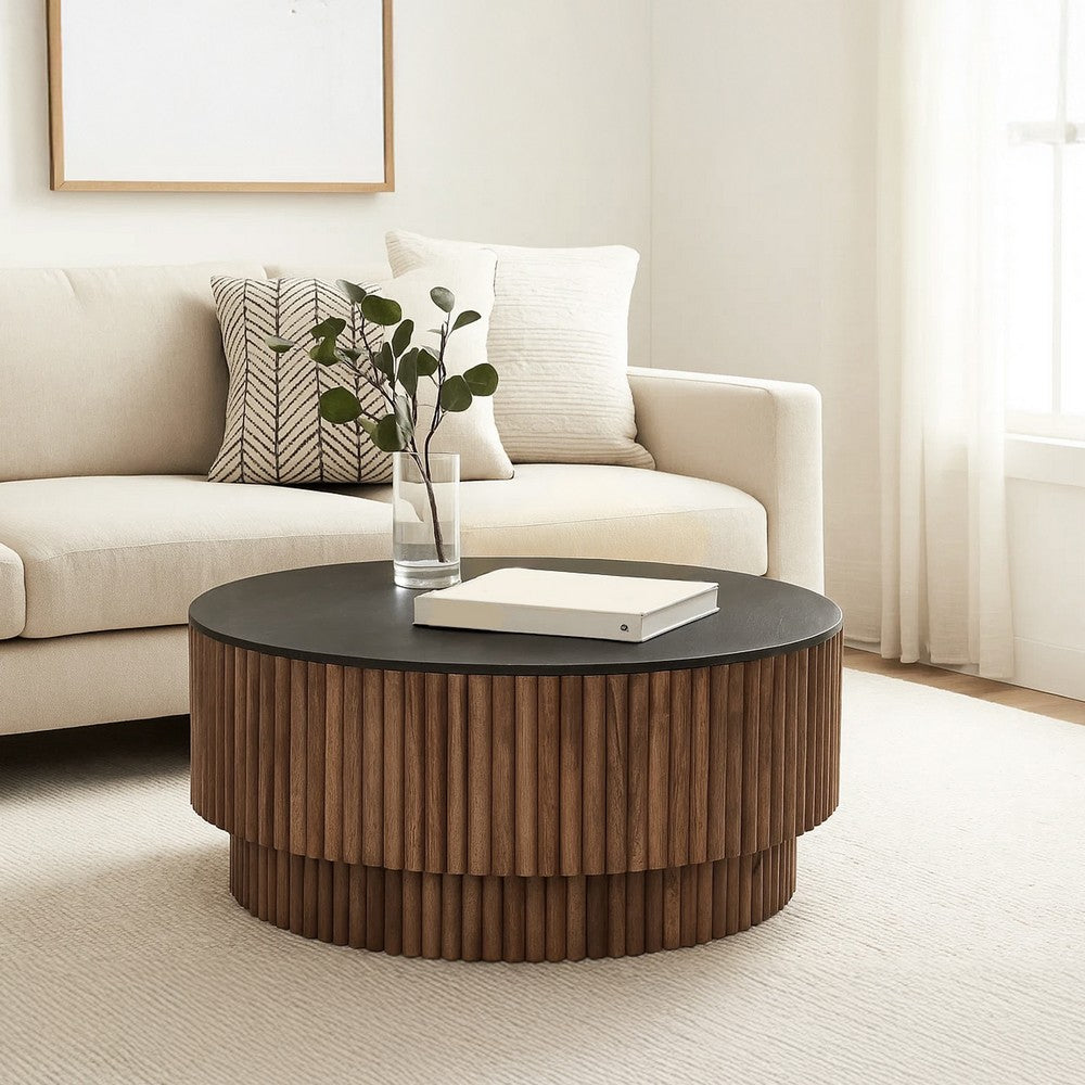 The Urban Port Montoya Coffee Table | 34" Round Black Top | Brown Mango Wood Fluted Plinth Base