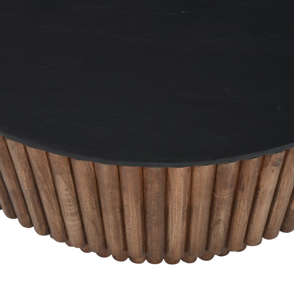The Urban Port Montoya Coffee Table | 34" Round Black Top | Brown Mango Wood Fluted Plinth Base