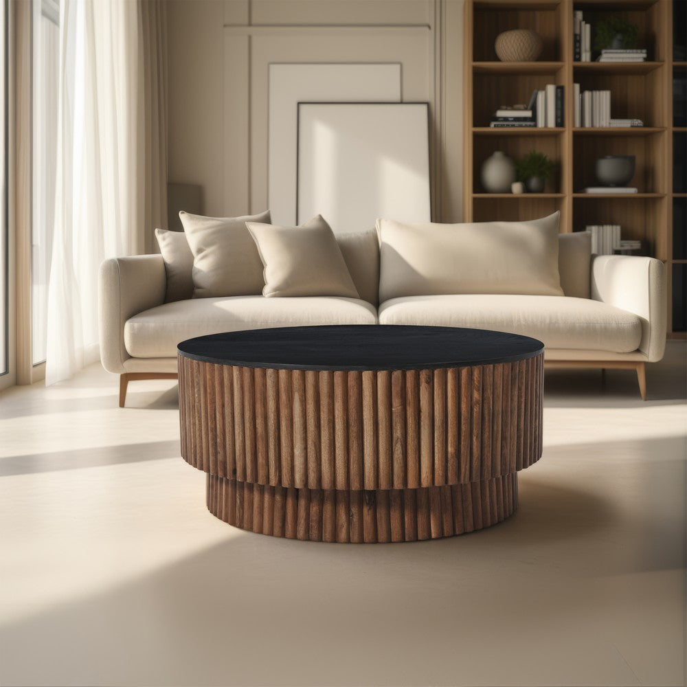 The Urban Port Montoya Coffee Table | 34" Round Black Top | Brown Mango Wood Fluted Plinth Base
