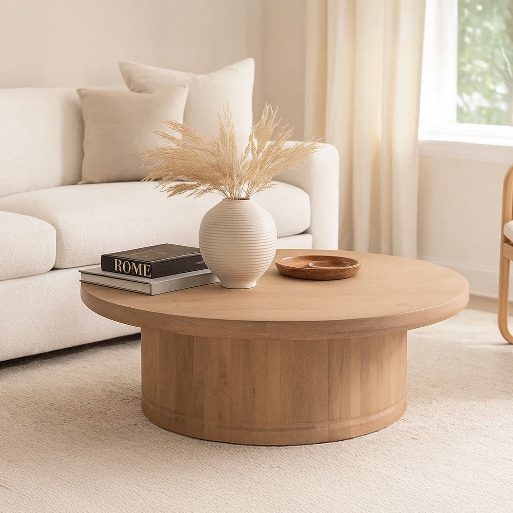 The Urban Port Bela Coffee Table | 47 Inch Round Top | Handcrafted Beige Mango Wood Pedestal Base